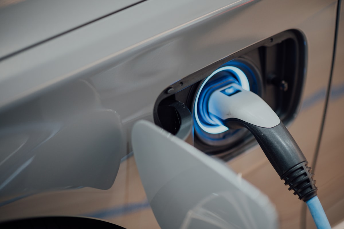 A wall-mounted EV charger newly installed in a residential garage.